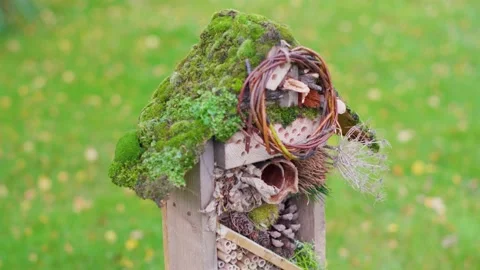 Tilt Down Of Beautiful Handmade Rustic Bug Box Hotel Garden Habitat Video stock 141740286
