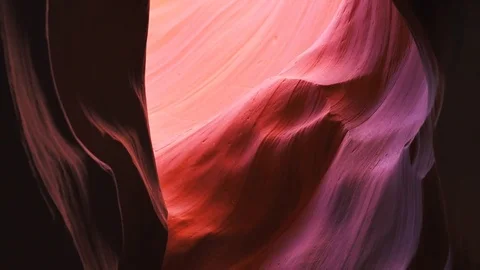 Tilt down of a beautifully colored wall in upper antelope canyon at page,az Stock Footage 75660604