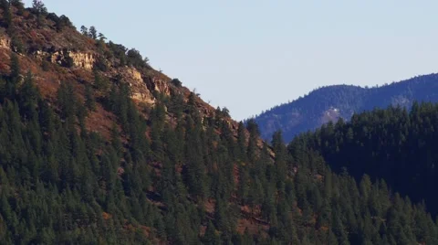 Tilt down from blue ky to mountains, 4K Stock Footage 56433501