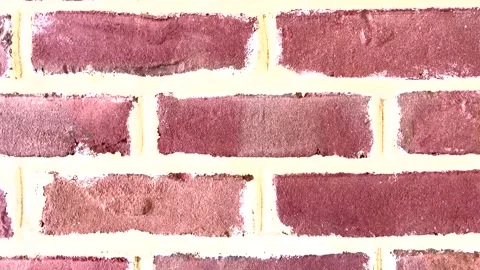 Tilt down of a Brick wall texture background Video stock 174383042
