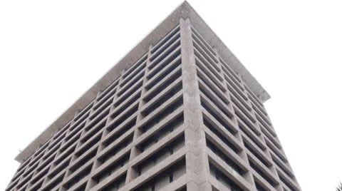 Tilt down from building to beautiful red flowers Stock Footage 24127482