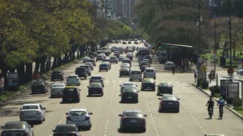 Tilt down of busy traffic driving on Figueroa Alcorta avenue at daytime Stock-Footage 140622971
