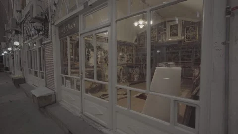 Tilt Down Carpet Gallery Window Persian Carpet Paintings Tabriz Bazar Iran (RAW) Stock Footage 331594303