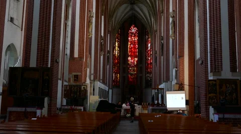 Tilt down from the ceiling to the floor in a romanesque church Stock Footage 67894638