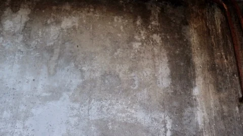 Tilt Down Cement Wall To Old Chair Sitting In Abandoned Room. Fire Damage. Stock Footage 113872636