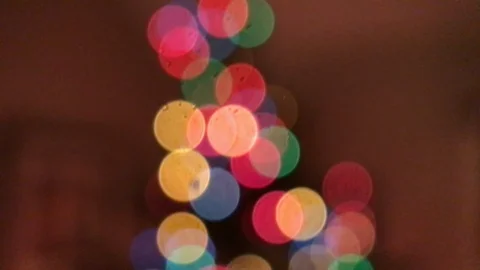 Tilt down Christmas Tree Lights Bokeh Stock Footage 100605242