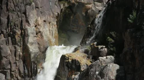 Tilt down close up of raging waterfall Nethercote Falls NSW Australia Stock Footage 11169230
