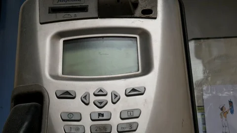 Tilt down   close up shot on vintage metallic public phone Stock Footage 121925582