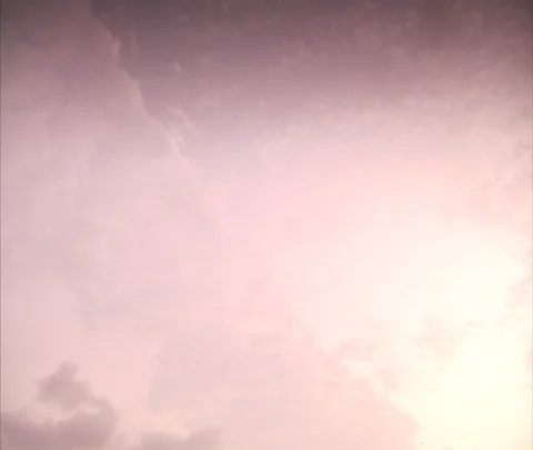 Tilt down from cloudy sky to Marine Drive skyline and bay at dusk. Stock Footage 86742400