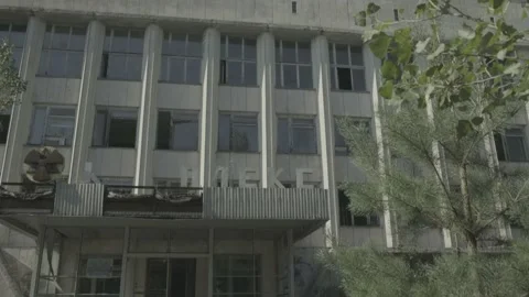 Tilt down derelict office block in Pripyat Stock Footage 143896181