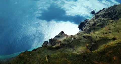 Tilt-Down Drone over El Hierro Cliffs and Sparkling Atlantic, Canary Islands Video stock 316670326