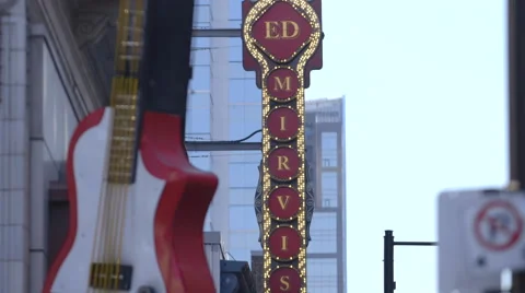 Tilt down Ed Mirvish sign to Pedestriants walking on Yonge street Stock Footage 44267342