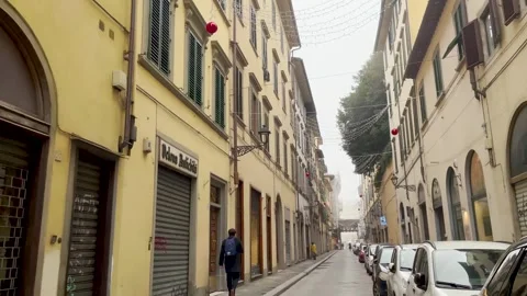 Tilt down on an empty street with Christmas decorations on a foggy morning Stock Footage 264711748
