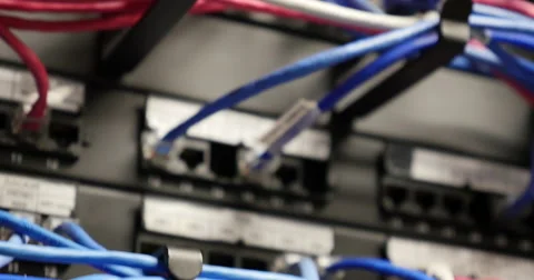 Tilt down of Ethernet cables in a Television station Stock Footage 45488840