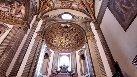 Tilt down from frescoes on ceiling of Parma Cathedral to shrine to Mary, Italy Stock-Footage 296729439