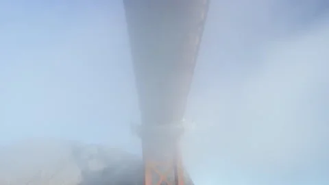 Tilt down from Golden Gate Bridge to support, from underneath in slow motion Stock-Footage 242829173