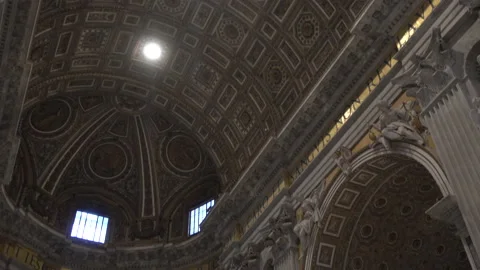 Tilt down from the grand ceiling of St Peters Basilica, Rome Stock Footage 137555074