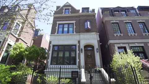 A tilt down of a homes exterior. Видео 80319162