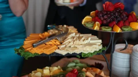 Tilt Down hors d'oeuvres at wedding Cheese and fruit Stock Footage 11874656