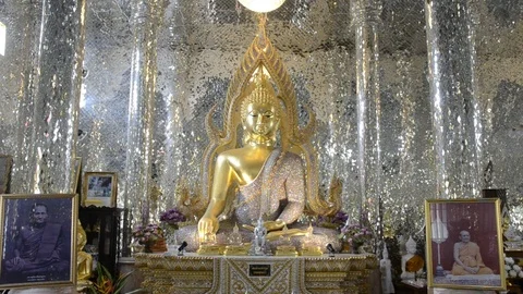 Tilt down image Buddha and glass temple. Stock Footage 79747373