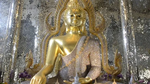 Tilt down image Buddha and glass temple. Video stock 79781583