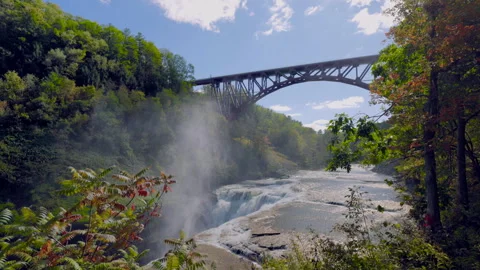 Tilt Down Letchworth State Park with Falls and Bridge Slow Framed Foliage Stock Footage 241041853