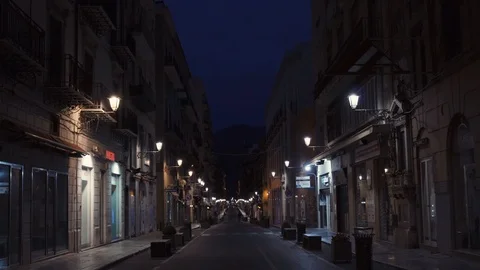Tilt down, A lit Street in Palermo at night Stock Footage 88632531