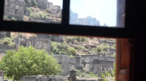 Tilt down - Looking out through window on Remote Eastern Village  in Turkey Stock Footage 40523774