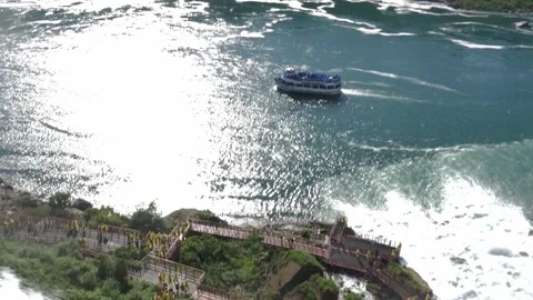 Tilt down on maid of the mist dock at niagara falls Stock Footage 143472218