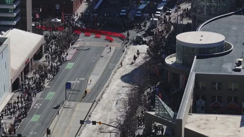 Tilt-down medium aerial drone shot of the 2nd Annual Salt Lake Winter Roundup Video stock 347979296