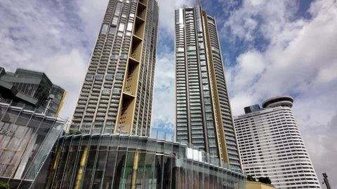 Tilt down modern apartment blocks to Iconsiam mall in Central Bangkok. Stock Footage 323177731