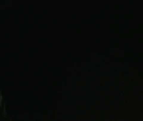 Tilt down from night sky to crowded night market. Stock Footage 86742301