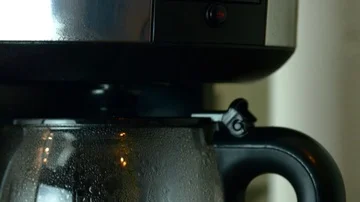 Tilt Down Over A Coffee Machine In Function, Fragrant Coffee Brewing, Morning Video stock 85555879