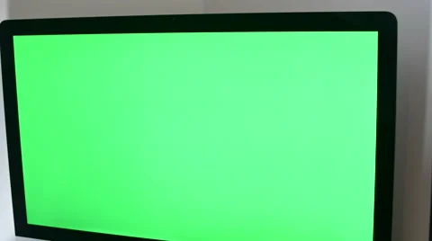 Tilt Down Over An Editor's  Working Station, Green Screen Monitor, Side Shot Stock Footage 64045235