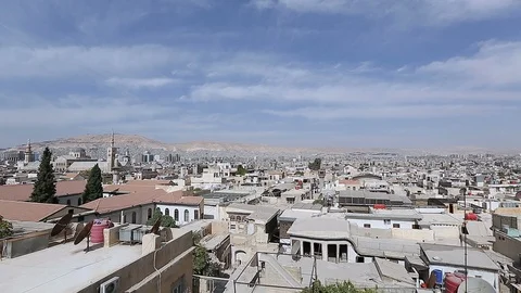 Tilt down with Pan right on Damascus' skyline, Syria Stock Footage 119650166