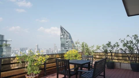 Tilt Down To Rooftop Terrace Overlooking Bangkok City Skyline Stock Footage 341837411
