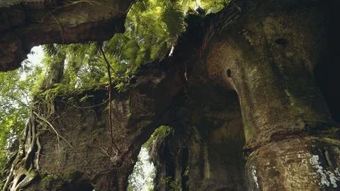 Tilt down ruins of old Fort Karang Bolong Stock Footage 89487345