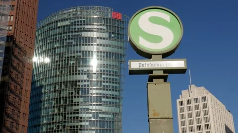 Tilt down from S-Bahn sign to Potsdamer Platz Stock Footage 57437344