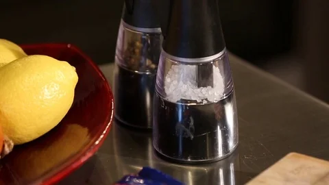 Tilt Down on Salt and Pepper Shakers Stock Footage 81276726