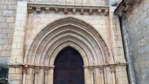 Tilt down of San Bartolomé hermitage entrance in Río Lobos Stock Footage 328679087