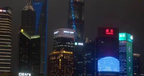 Tilt down SHANGHAI Tower and Aurora building skyline at night in CHINA 库存影片 344950771