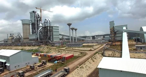 Tilt down shot of a big cement factory Stock Footage 106383578