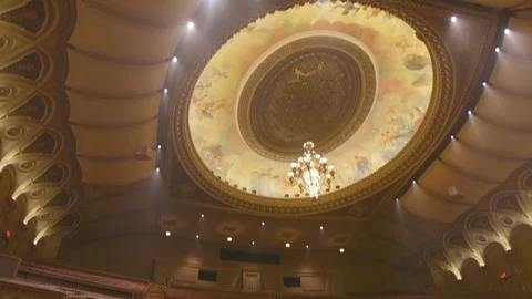 Tilt down shot of an empty music venue auditorium theatre seating Stock Footage 103347558