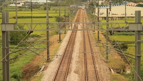 Tilt-down shot of high speed train(KTX) passing by Stock Footage 8640052