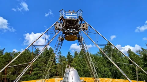 Tilt-down shot of historic Soviet RT-32 radio telescope in Irbene Latvia, Stock Footage 282186950