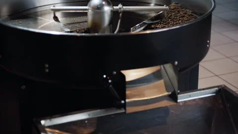 Tilt-Down Shot of Last Coffee Beans Dropping into Collector 库存影片 307591167