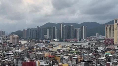 Tilt down shot of Macau old and new residential buildings and houses Stock Footage 273188779