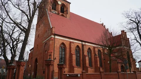 Tilt Down Shot of St. Peter and Paul Church in Puck, Poland Stock Footage 343895363
