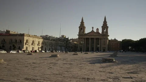 Tilt down shot of St. Publius Parish Church in Floriana, Malta Stock Footage 74861979