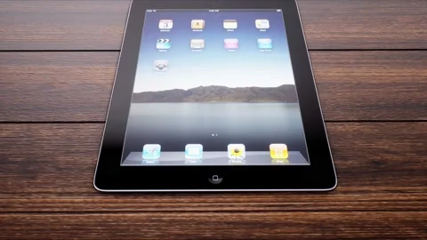 A Tilt down shot from tablet on desk Stock Footage 155223599